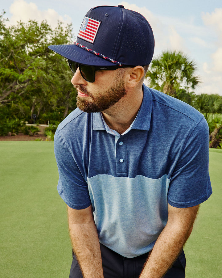 ELITE SOLID BLOCKED PERFORMANCE POLO