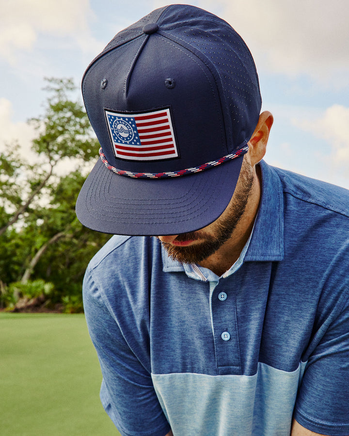 ELITE SOLID BLOCKED PERFORMANCE POLO