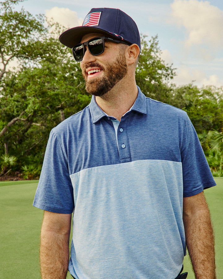 ELITE SOLID BLOCKED PERFORMANCE POLO