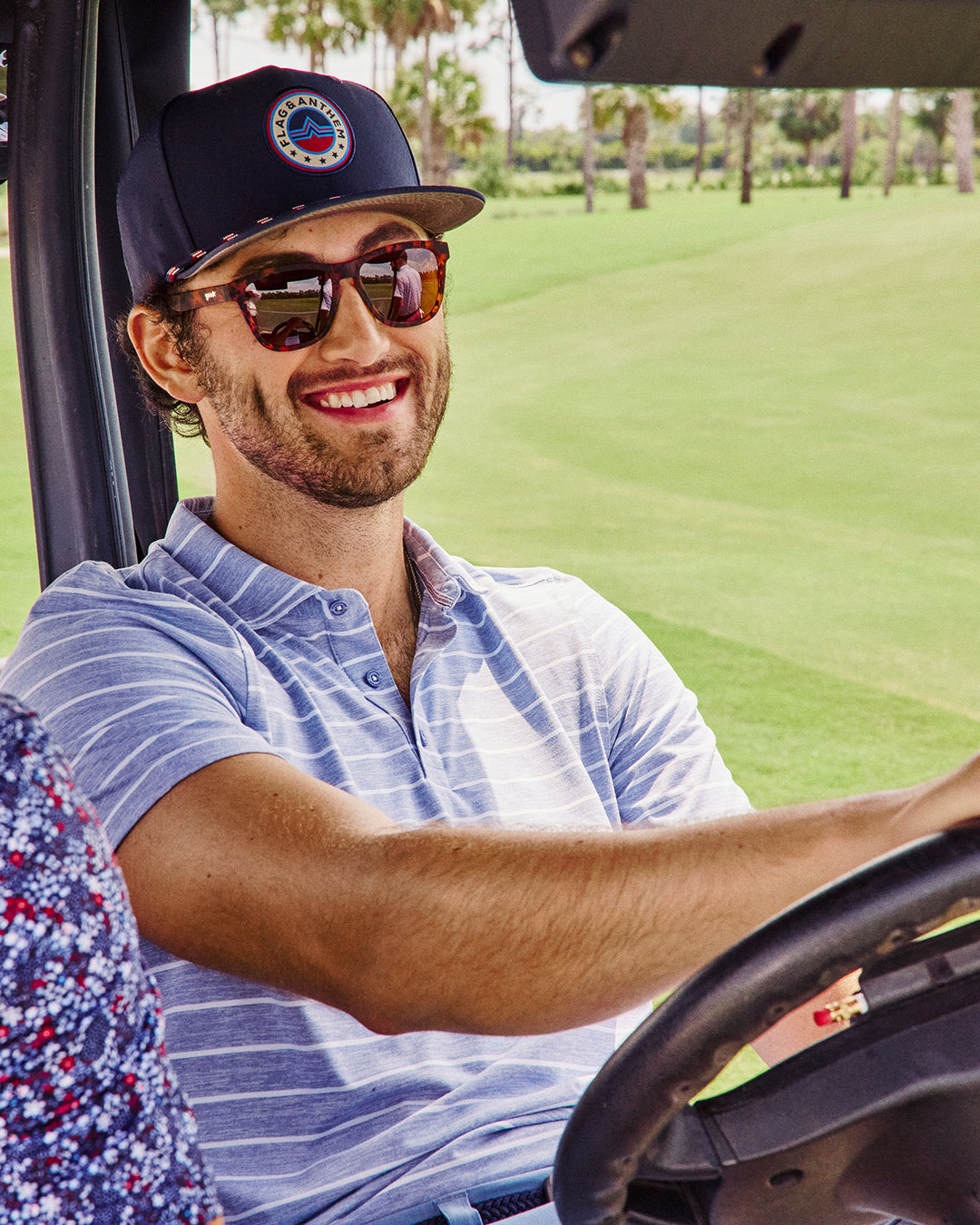 ELITE STRIPE PERFORMANCE POLO