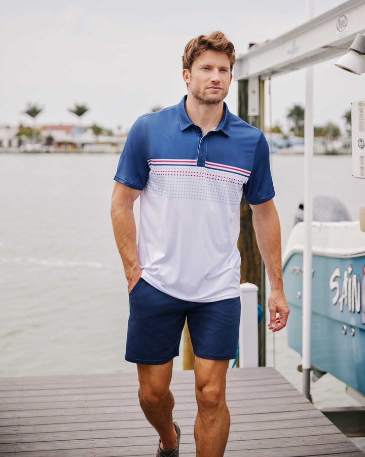 BANNER STARS & STRIPES BLOCKED PERFORMANCE POLO