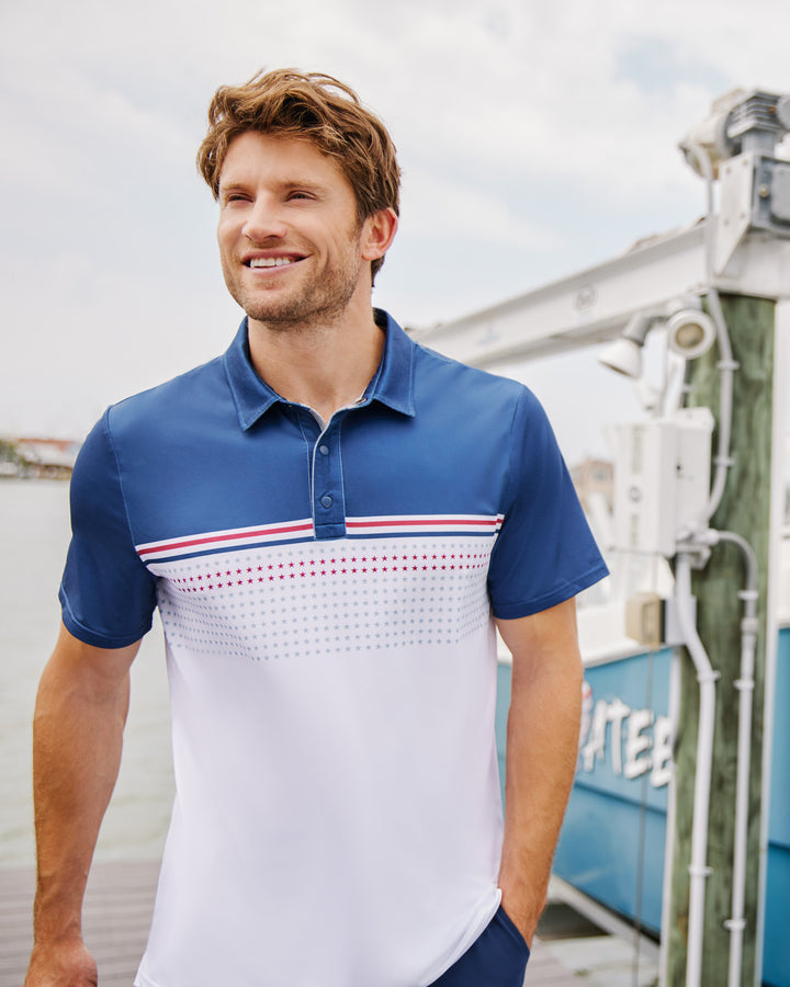 BANNER STARS & STRIPES BLOCKED PERFORMANCE POLO