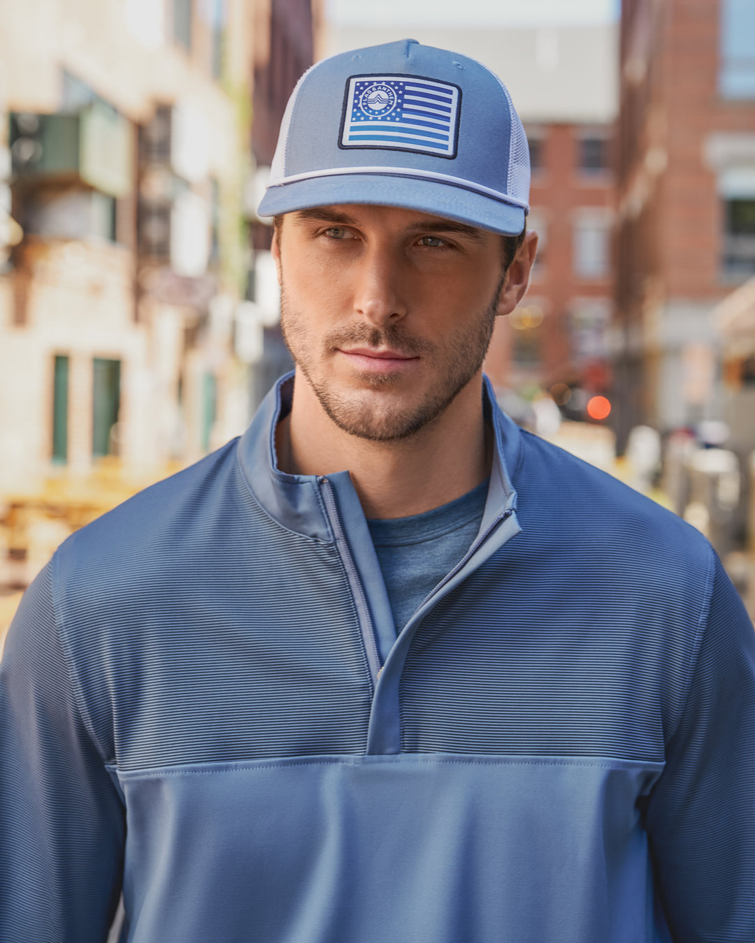 CORE FLAG ROPE TRUCKER HAT