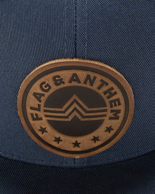 FLAG & ANTHEM X RANGE LEATHER CO. ICON TRUCKER HAT